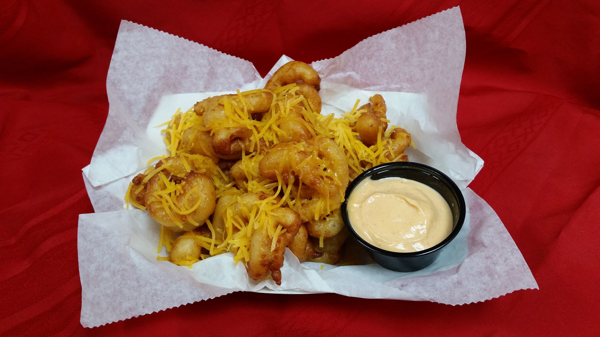 Cheesy Sriracha Funnel Cake Bites